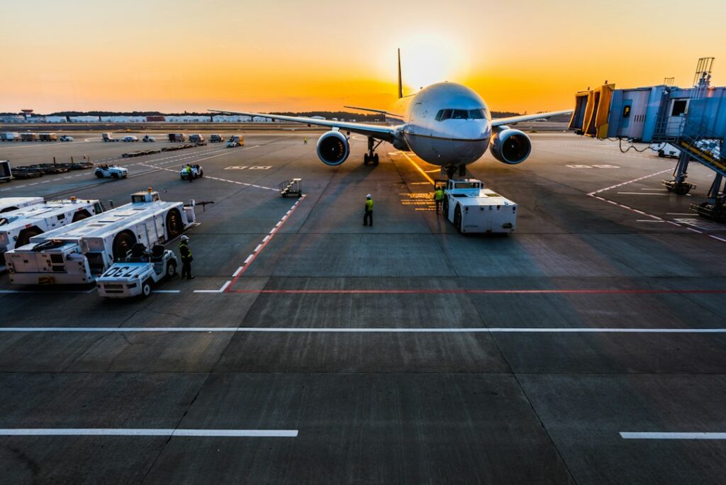 Aircraft parked at airport illustrating international air freight