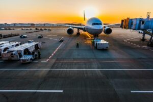 Aircraft parked at airport illustrating international air freight