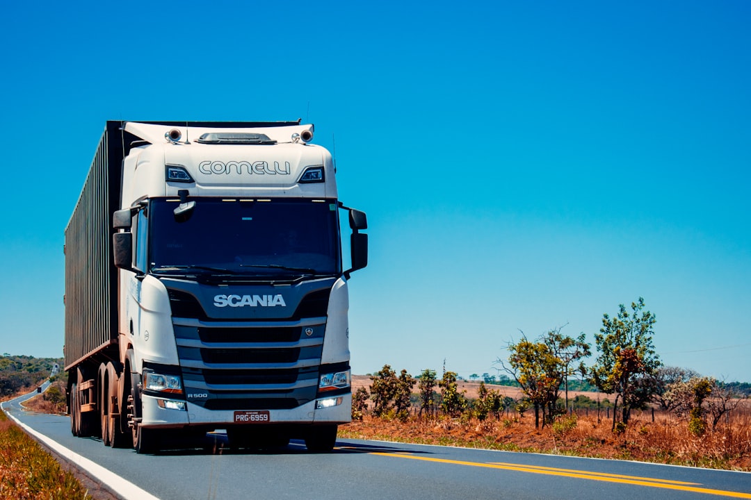 Cargo truck on highway representing road freight transportation